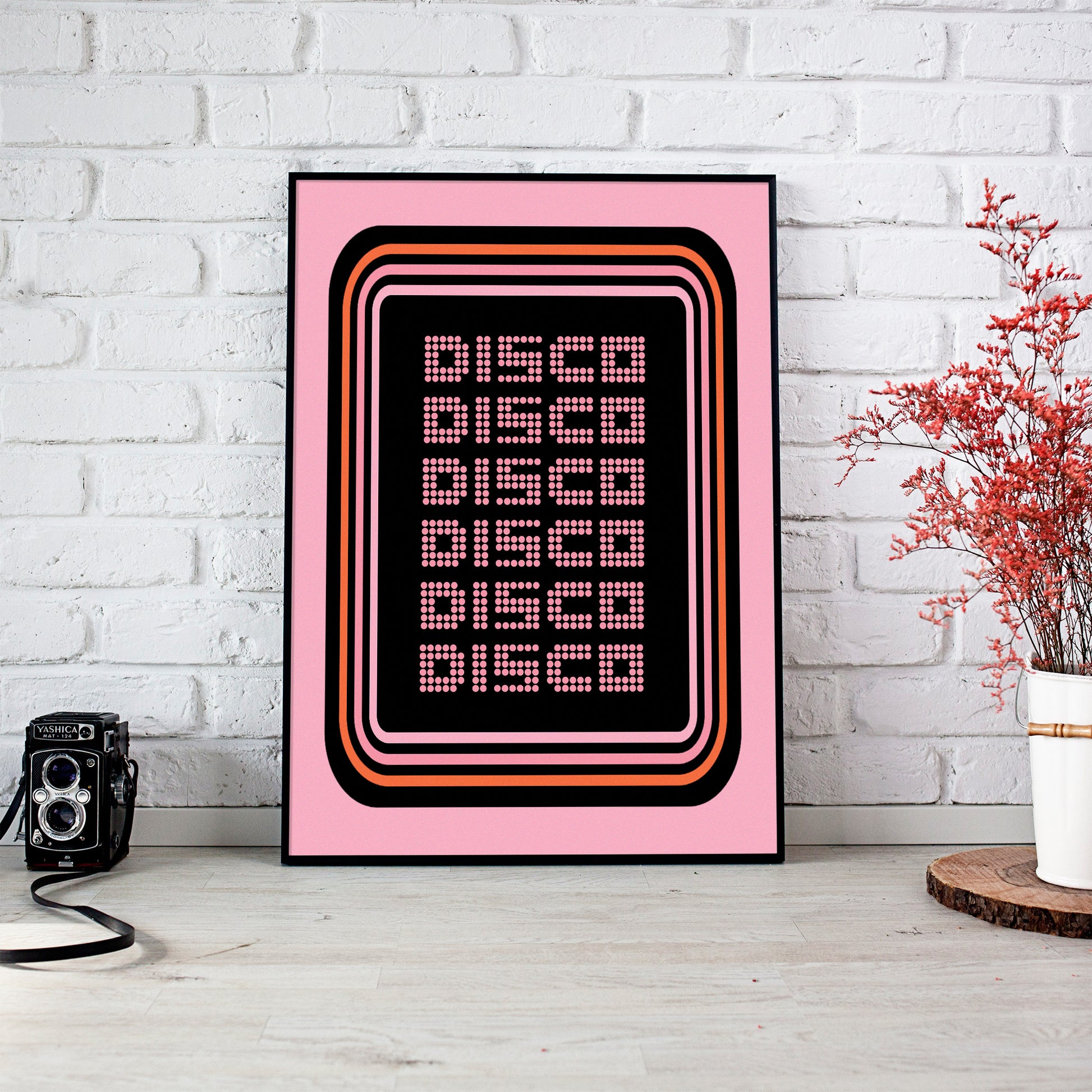 disco print pink disco disco repeat retro font mockup black frame white brick wall trendy apartment