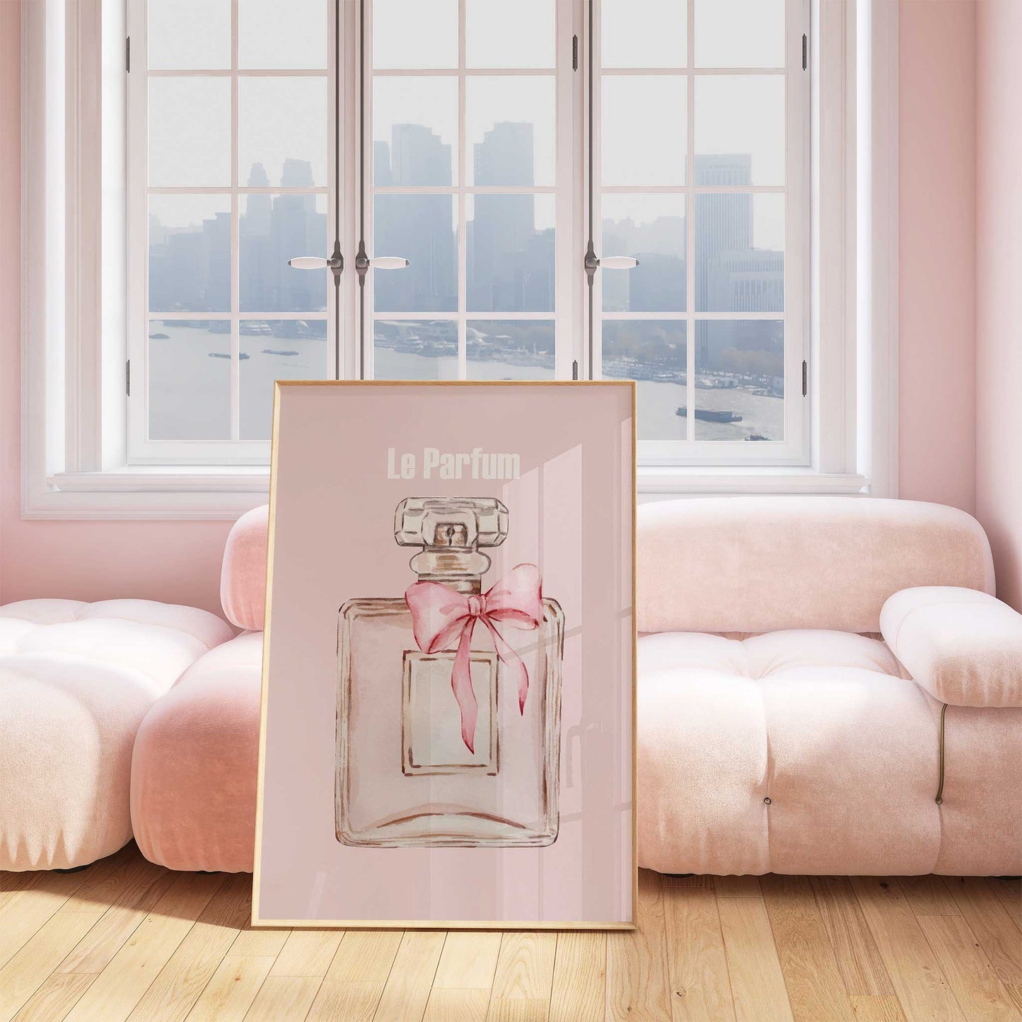 french perfume print in light pink frame mockup lounge pink sofa