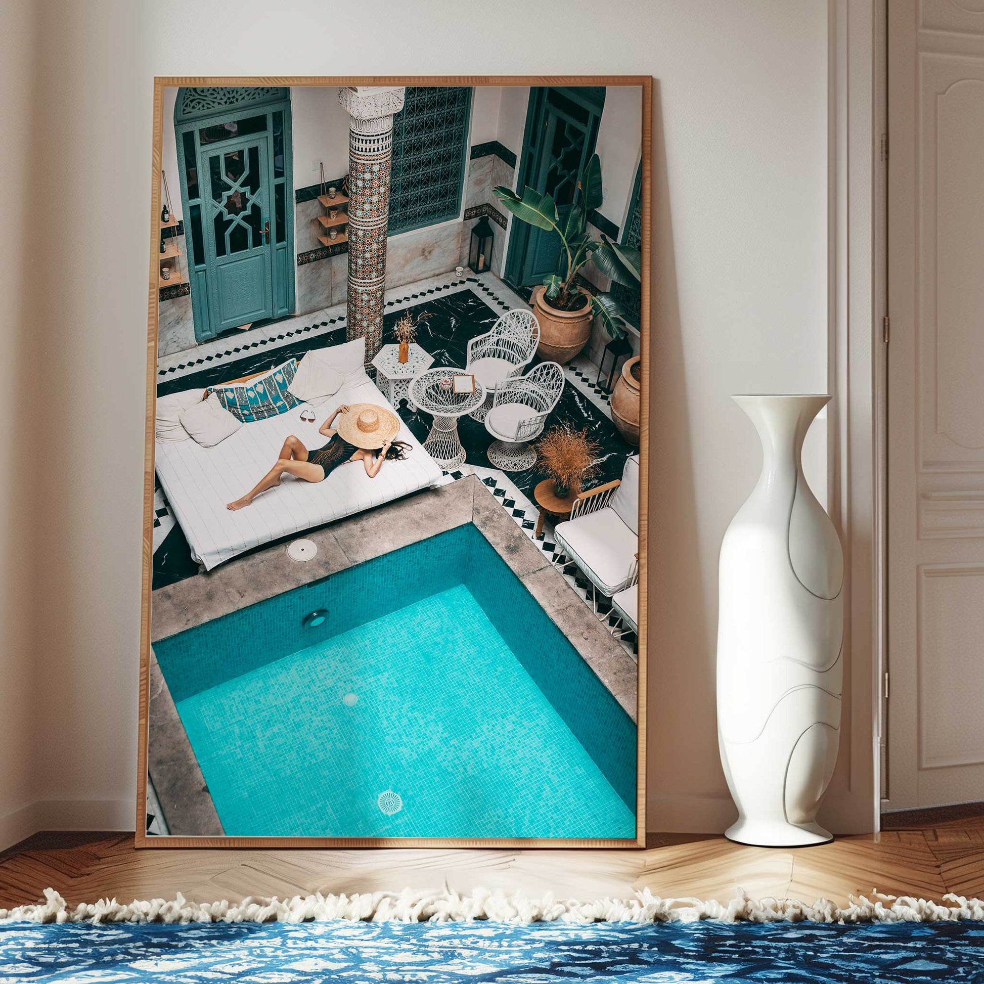 girl relaxing by pool print black frame mockup