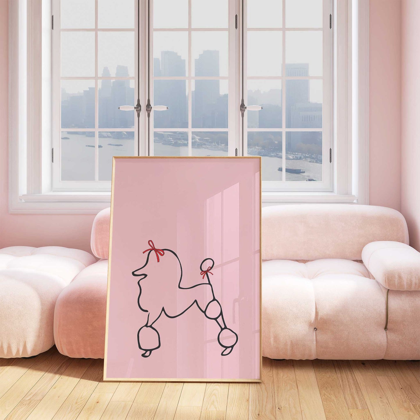 parisian poodle print in pink mockup framed in front of pink sofa