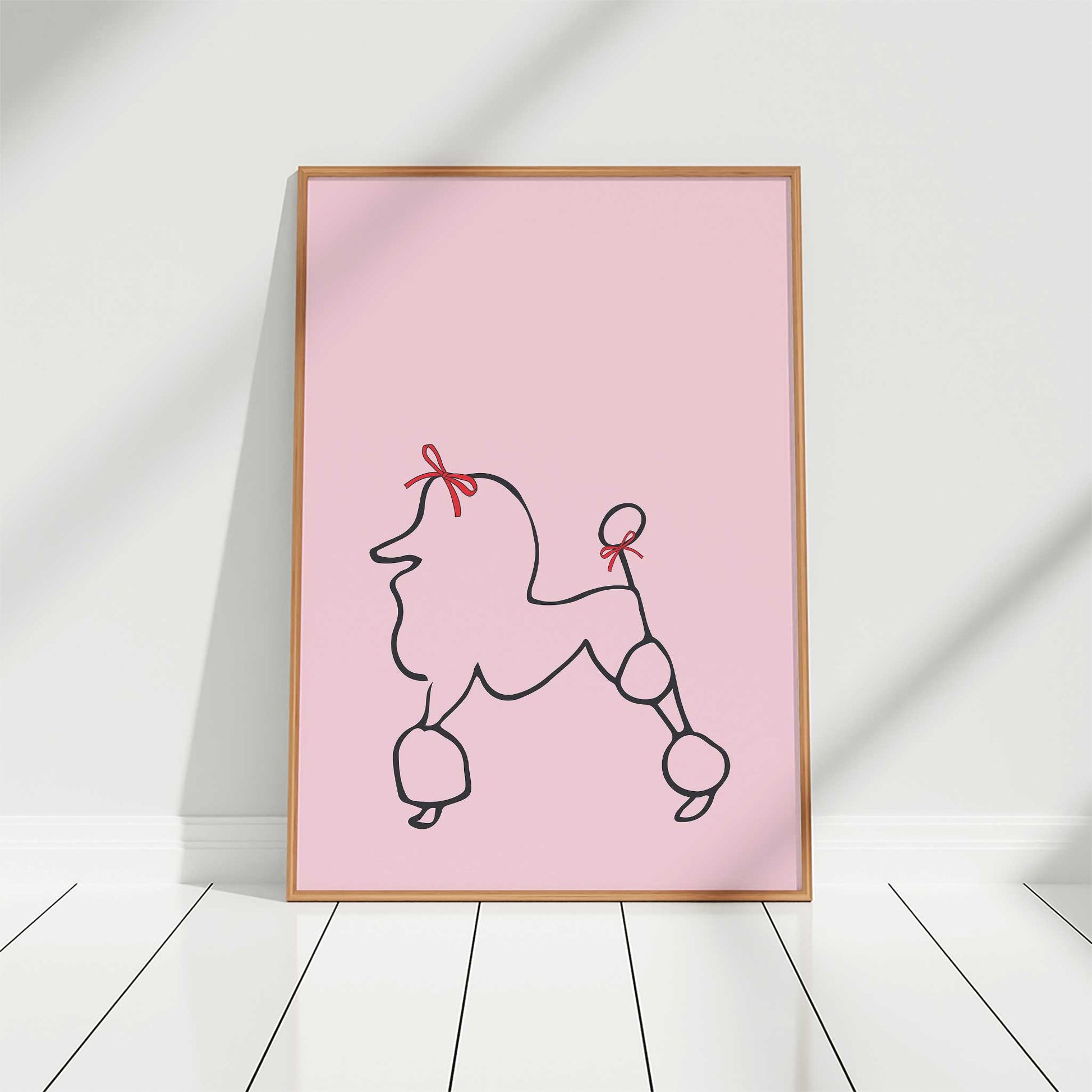 parisian poodle print in pink mockup light wood frame