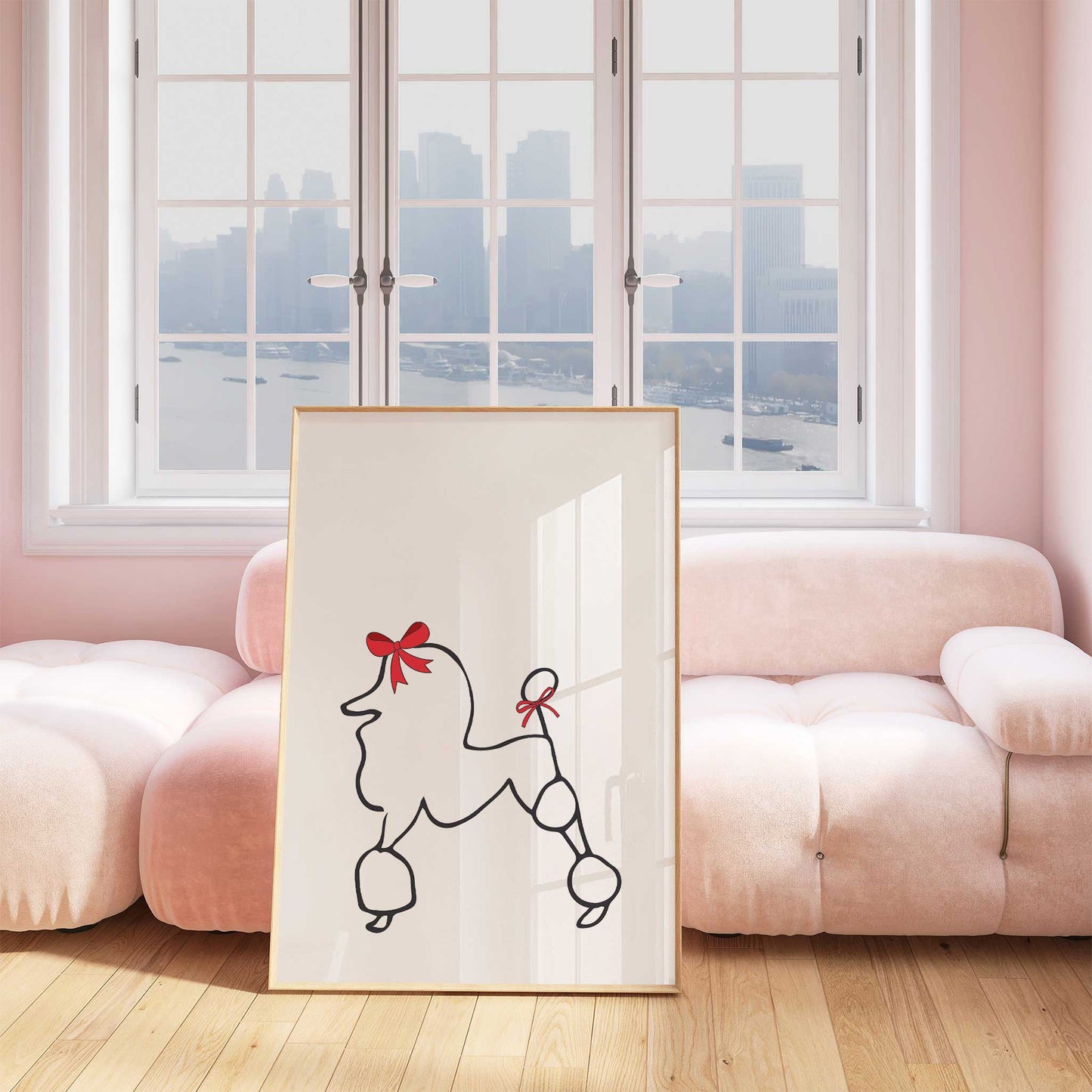 parisian poodle print in white mockup framed in front of pink sofa