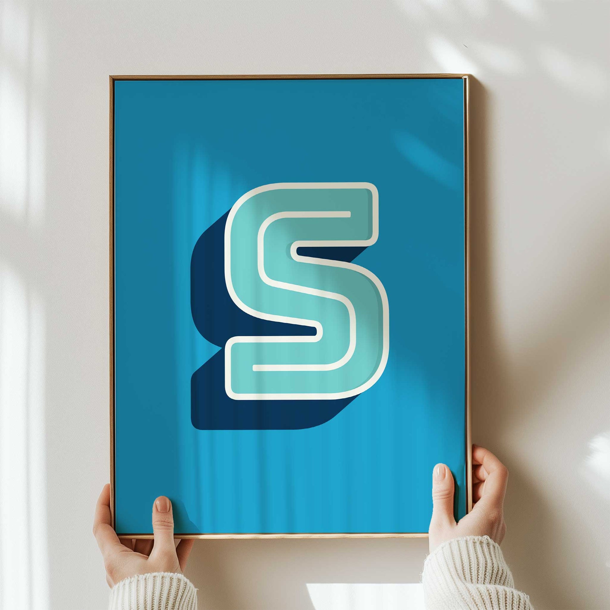 personalised letter blue and green print mockup framed on wall