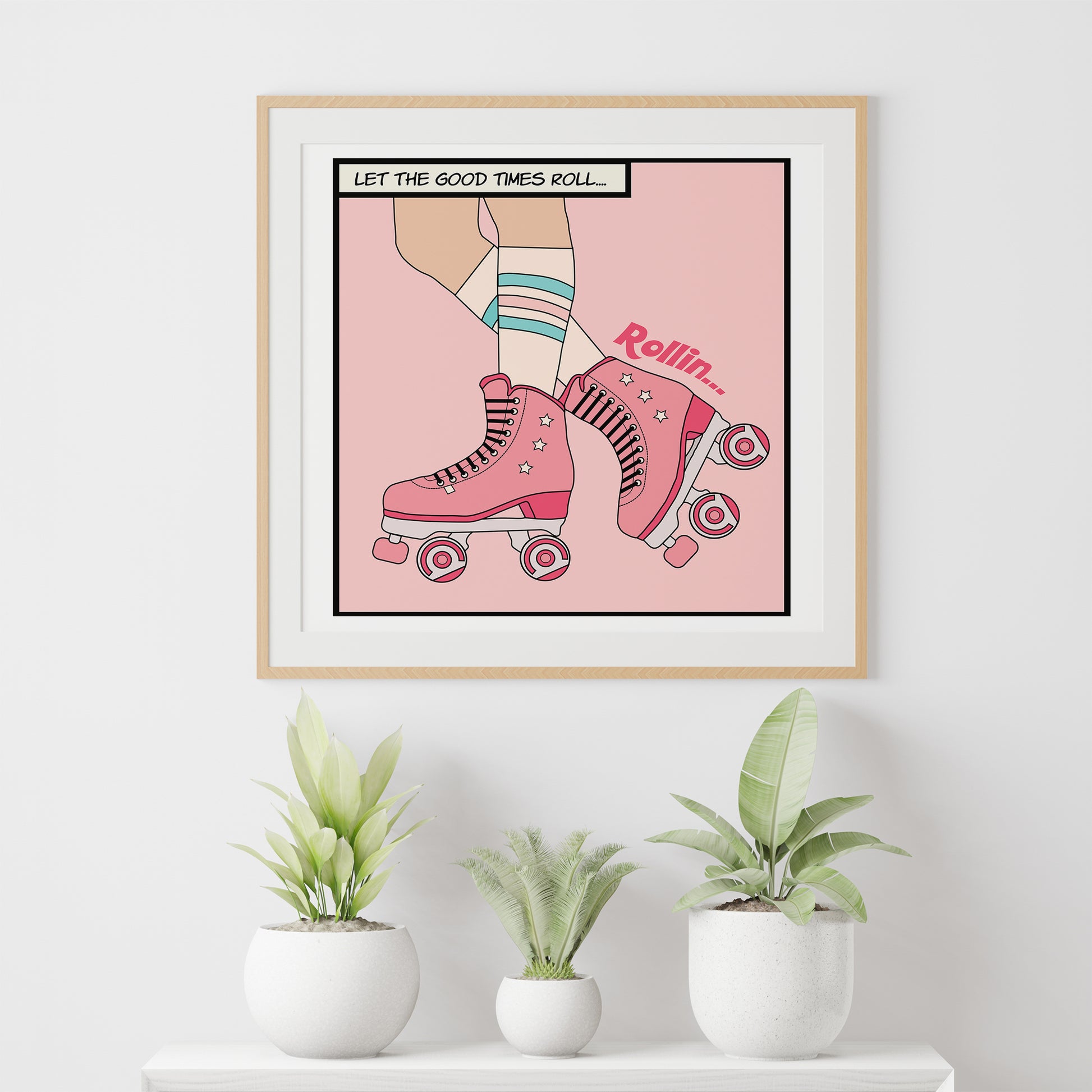 pink roller skates print mockup light wood frame white wall above pot plants