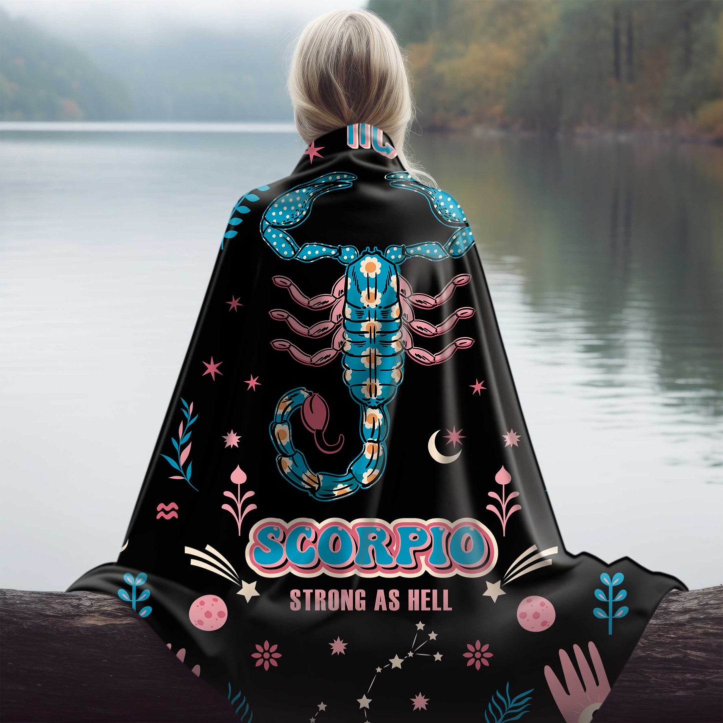 scorpio zodiac sherpa blanket draped over girl by river