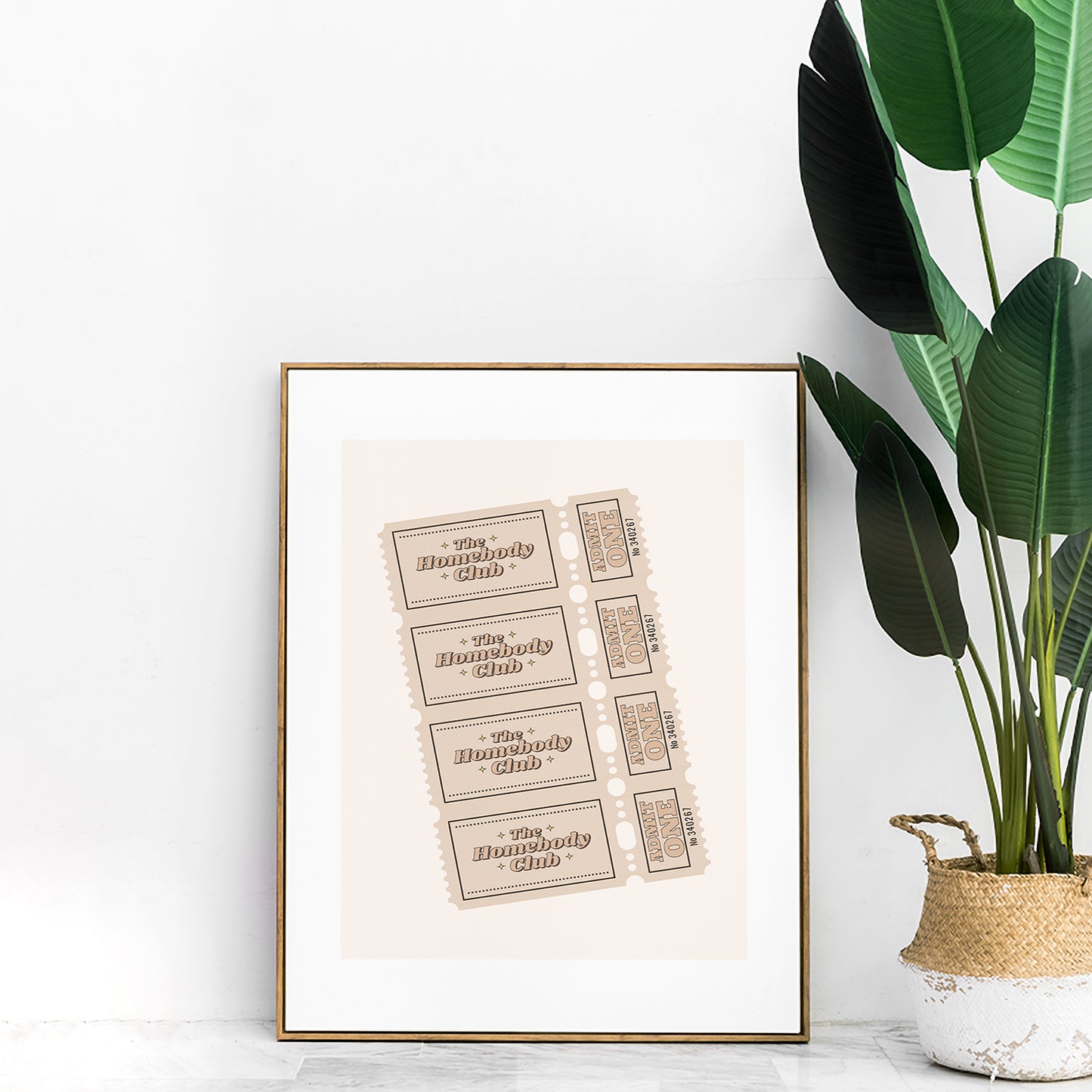 vintage ticket print the homebody club neutral color mockup gold frame cozy living room